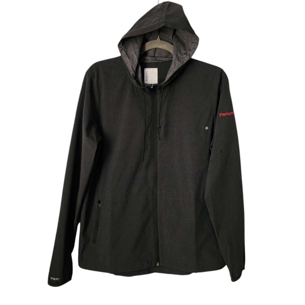 VUORI Outdoor Trainer Shell Jacket in dark charcoal grey size M